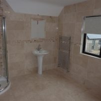 Tiled Marble and Mosaic Bathroom